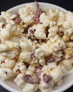 Popcorn gourmand chocolat blanc, cranberries & zeste d&rsquo;orange